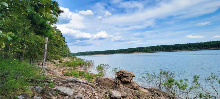 Beautiful Lake Lot in Fairfield bay to build your dream home or weekend getaway. Lot located in Grand Isle subdivision. FFB Marina in close by, FFB is full of amenities such as mini golf, two golf courses, 3 community pools, Hart Center, trails for walking/biking/UTV riding & so much more. (Some Pictures of lake are taken below the white line).