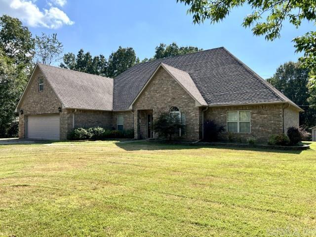 Large two story brick home in Westside school district, Bono, Arkansas. Up to 6 bedrooms and has 4.5 bathrooms. There are two living areas and a nice workshop. Picturesque area on pavement. This is not located in a subdivision, so there is no bill of assurance. You may park big trucks, campers, etc.