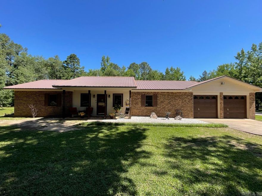 Experience the perfect blend of country and city convenience with this superbly maintained, one-owner estate on 3.48 sprawling acres. This beautiful all-electric home offers a rare sense of privacy where deer are frequent, yet you remain just minutes away from local amenities in Saline County. Built to last with 2x6 construction and featuring solid wood doors throughout, the interior boasts a spacious 4-bedroom, 2-bathroom layout complemented by a large game room or "man cave" perfect for entertaining. The home has been thoughtfully updated over the years, including new countertops and HVAC in 2018, fresh paint in 2022, and upgrades like new windows and insulated siding in 2021 and 2020. The property provides incredible utility and peace of mind with a new septic system installed in 2020 and a roof replaced in 2010. Outdoor enthusiasts and hobbyists will be drawn to the massive 30x40 shop built in 2013, which features two garage doors and ample space for projects, equipment, or vehicle storage. Combining durability, modern updates, and a picturesque acreage setting, this unique property is ready for its next chapter. Schedule your showing today!