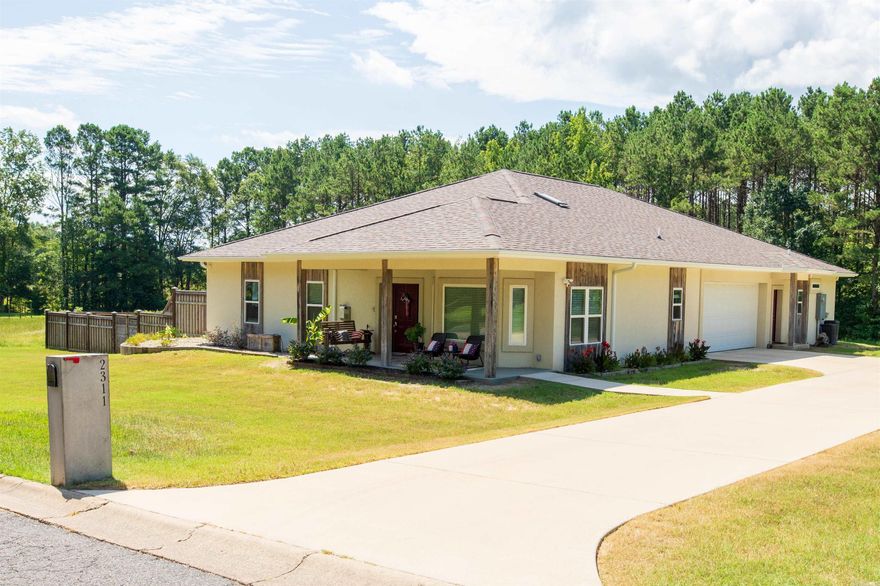 Discover peace of mind, energy efficiency, and modern comfort in this one-of-a-kind FORTIFIED Gold–certified Arkansas home—engineered to withstand EF-3 tornadoes. The thoughtfully designed layout features a 3-bedroom, 2-bath main home plus a separate 1-bedroom, 1-bath apartment with private entrance—perfect for guests, in-laws, etc.   Built with 6-inch reinforced ICF exterior walls, this home delivers superior insulation and storm resistance while keeping utility costs impressively low. Inside, enjoy premium upgrades including heated bathroom floors, a jetted tub, a built-in towel warmer, and an auto-closing skylight. The spacious primary closet doubles as a concrete safe room. Smart-home tech offers full control of lighting, climate, and security. A 3kW solar array generates $400–$500 annually, 2 ZeroSurge panels provides protection for 10 circuits, and dual EV chargers add future-ready convenience.   Additional features include a semi-conditioned attic, Haiku fans, and a fenced backyard pre-wired for a pool. With exceptional energy savings, this home delivers unmatched value, next-level convenience in a quiet neighborhood.