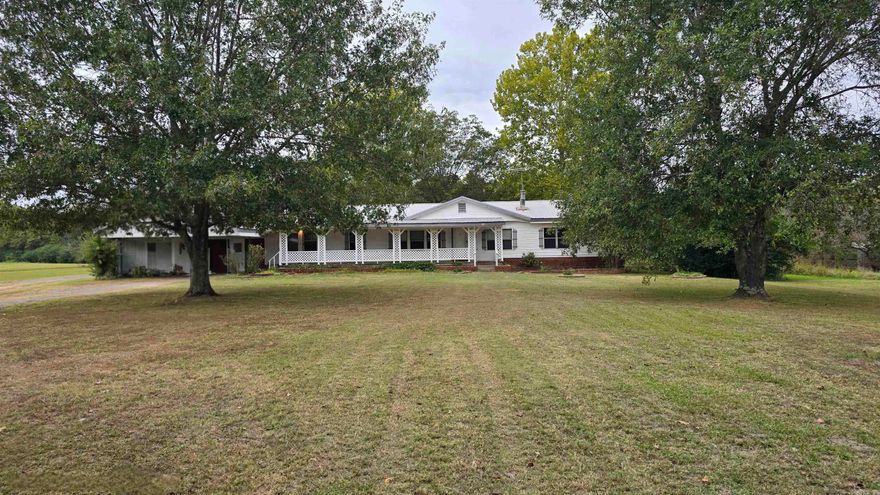Diamond in the rough. This home has lots to offer. Large living room, could be 5  bedrooms, office space, lots of storage areas, 2 outside buildings all on 1.75 acres.