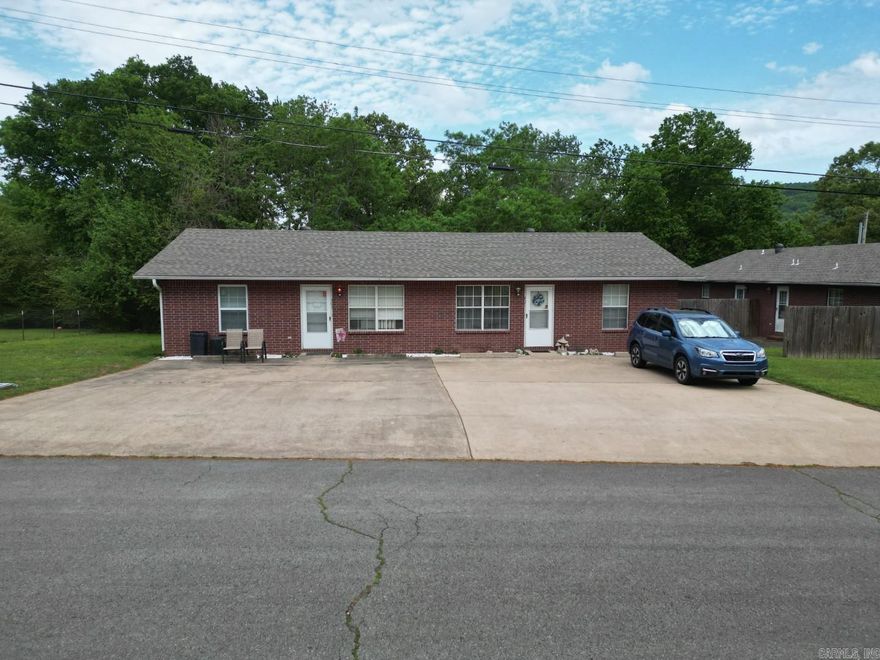 Well maintained investment opportunity in the heart of Heber Springs! This property includes two duplex-style condos each building offering two units, for a total of four 2-bedroom, 1 bath units. Conveniently located at 401 & 403 N Conway St and 500 & 502 E Pine St, just minutes from the city park, shopping, and local amenities. Each unit offers functional layouts with strong rental potential. Properties have been well cared for with newer roofs already in place. Ideal for investors looking to expand their portfolio or live in one unit while generating income from the others.