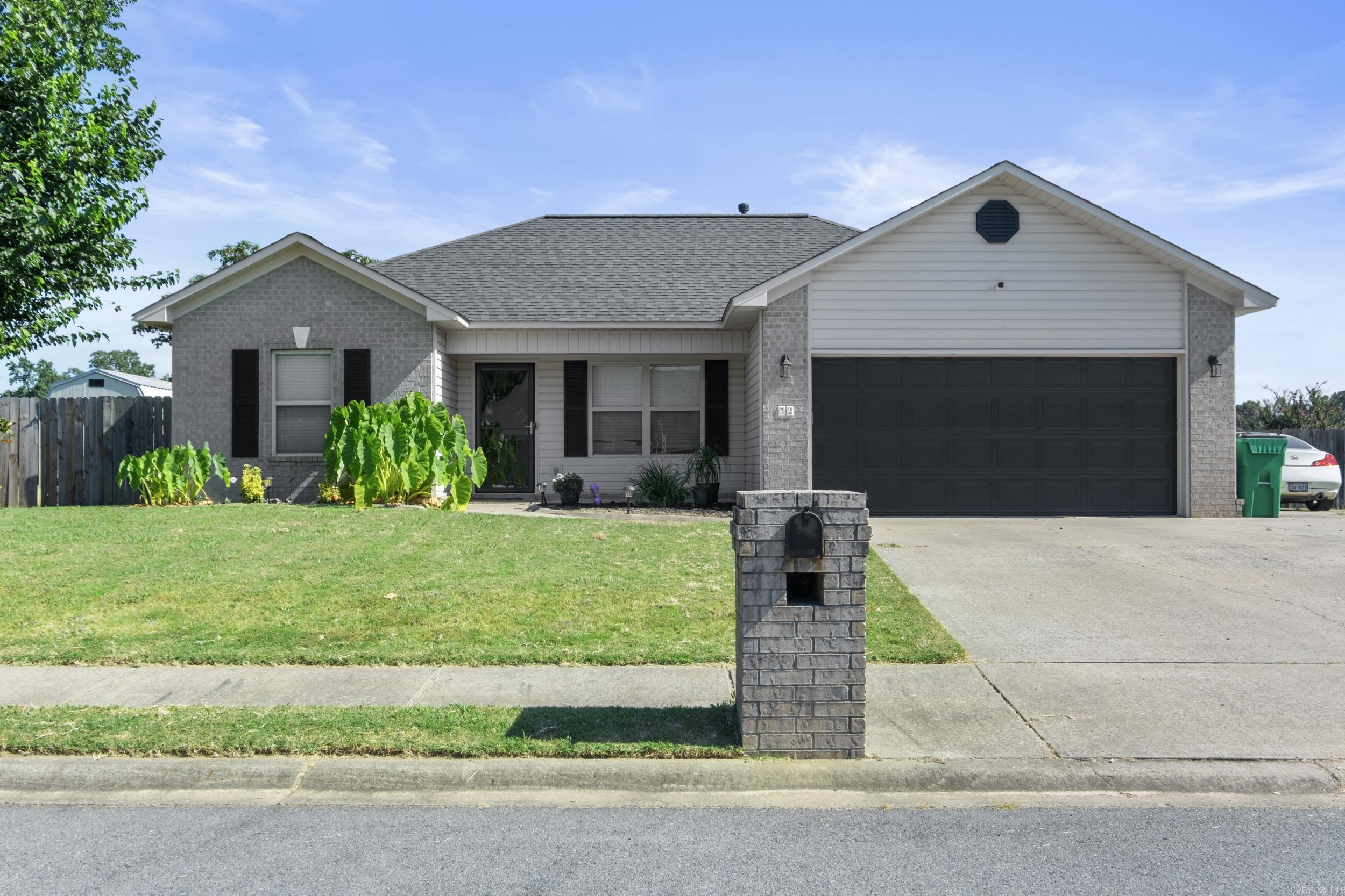 OH SO CUTE!! This house is Move-In Ready! Open Floor Plan Features a Large Great Room with Tray Ceilings, Nice Kitchen with Stainless Appliances, Pantry, and Large Breakfast Area! The primary bedroom is split from secondary ones with large walk-in closet. Both spare rooms are Large. The backyard features a huge covered deck and privacy fenced backyard. Additional parking pad too! Awesome Neighborhood and Convenient to Schools! A MUST SEE!