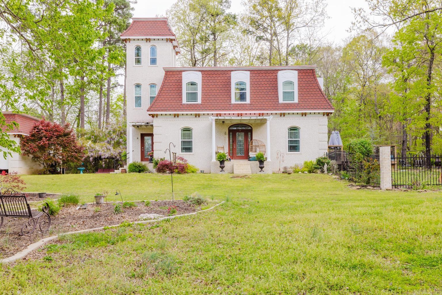 This charming and unique home offers character and comfort in every corner. The great room is open and inviting, perfect for cozy nights in or hosting friends and family. The kitchen features painted cabinets, a center island, a pantry, and both an eat-in area and a formal dining space. The main floor includes one bedroom and bathroom, while upstairs you'll find two additional bedrooms and a full bath. The extra-large master suite is a true retreat, with plenty of space for a home office or a cozy sitting area. It has access to an unfinished third-level towerābursting with potential for a creative studio, reading nook, or additional living space. Enjoy the warmth of gorgeous knotted pine floors, and step out onto a brand-new deck just off the kitchenāperfect for entertaining or sipping your morning coffee. The backyard is enhanced by gorgeous landscaping and thoughtfully designed raised bed gardens, offering beauty and functionality for any green thumb. With a detached garage, a large front yard, and undeniable curb appeal, this home offers something special you wonāt find in a typical layout.