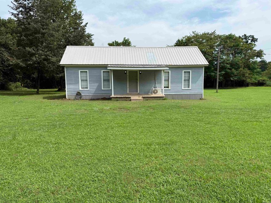 This 3 bedroom 1 1/2 bath home offers 1,240 sqft of comfort. Recently renovated and ready for you to make it yours! This one acre lot sits right outside of city limits but minutes away from all you local amenities. Enjoy the serenity of this outdoor space with some family grilling in the summers, start your own gardening or simply relaxing in the outdoors. Call me today to schedule your showing!