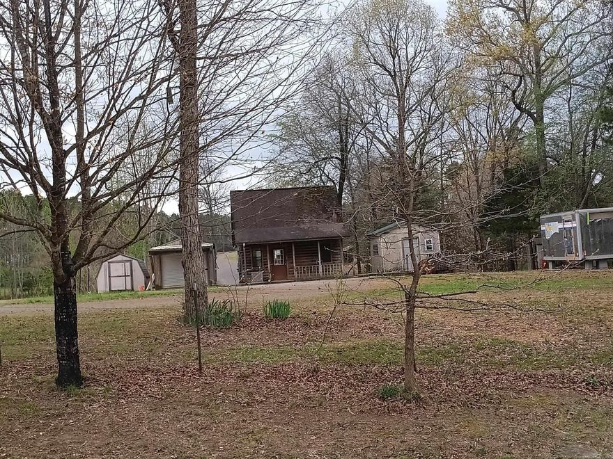 Small cabin with bedroom upstairs & front porch with a bathroom & kitchenette on 15 unrestricted acres previously Rosebud Off Road Park & also a towing company. It could be opened back up & operated or just used as a hobby 4-wheel riding area. Could be used as residential, hobby farm, business & or work from home. Needs repair & some clean up but listed as a fixer upper. There are several storage buildings, containers for storage & even an old mobile home & shop on the property. The entire property is fenced. Property is in probate & will be sold "As is". No owner financing. RD, FHA or VA loans will be considered only Conventional In-House Loans or Cash. See agent remarks.