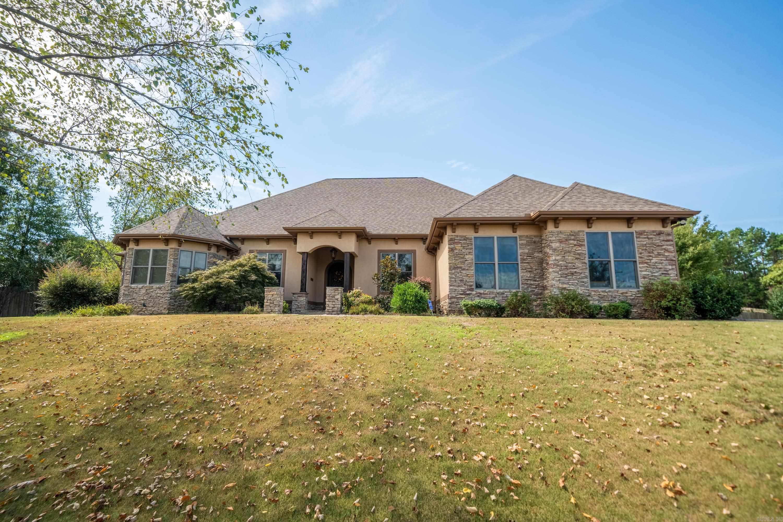 Discover the "Wow Factor" throughout this stunning custom-built 5-bedroom, 3-bathroom home located in the prestigious gated Quail Ridge subdivision. From the moment you step through the striking wood front door, you're greeted by a breathtaking view of the meticulously landscaped backyard paradise, framed by walls of glass. The grounds are a haven of tranquility, featuring a spectacular pool surrounded by lush greenery, offering ultimate privacy. Inside, the home boasts an impressive open and flowing floor plan. With the versatility of 4 or 5 bedrooms, it includes two spacious living areas, a formal dining room, and an upstairs game room, perfect for entertaining or family fun. Every detail has been thoughtfully designed, with beautiful finishes throughout (including new flooring) and ample storage options. Additional highlights include an oversized 3-car garage, sitting on a generous 1-acre lot, providing plenty of space to enjoy both indoors and outdoors. This is a home that combines elegance with practicality in a lush, serene environment. ** New Roof in 2025**
