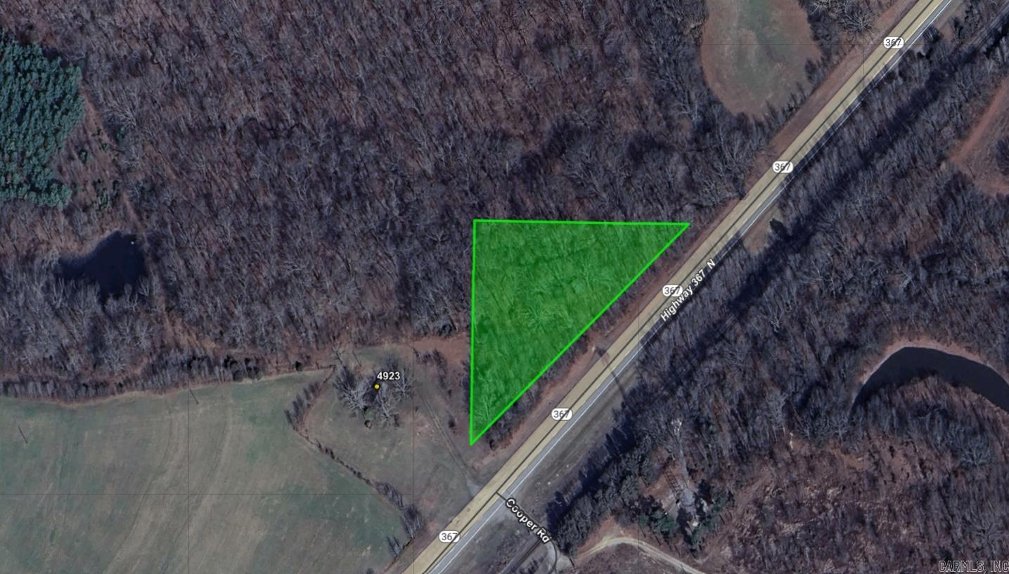 1.5 acres with road access. Has Power to property. Owner will finance