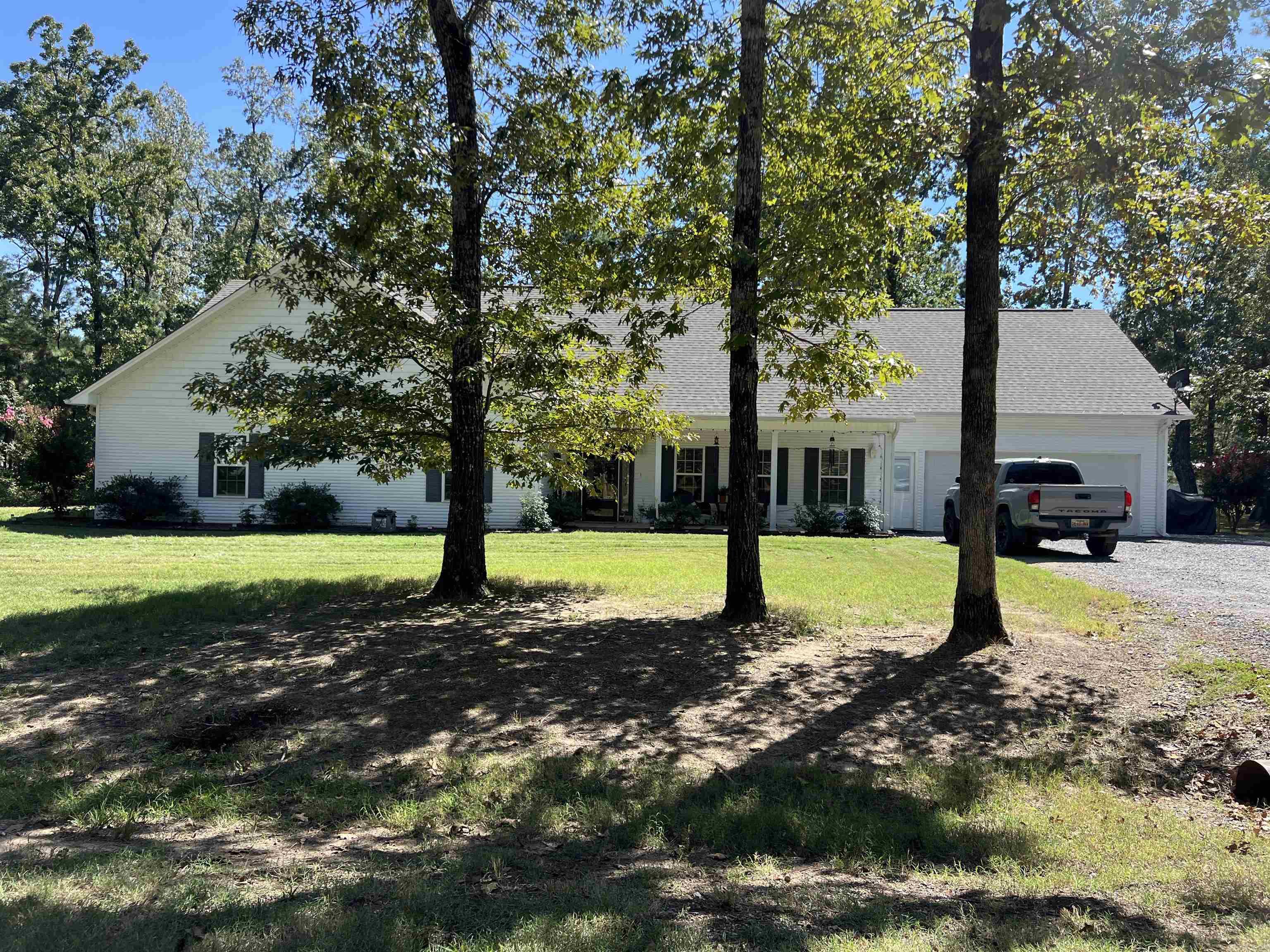 Discover this spacious three-bedroom, two-and-a-half-bath home sitting on 1.2 acres, with the opportunity to purchase additional acreage in the future. Designed with an open floor plan, the home features a large kitchen ideal for gatherings, a large walk in pantry, an oversized garage for plenty of storage and parking. Enjoy peace of mind with a Generac whole-house generator and relax by the gas log fireplace in the living area. The home also includes a dedicated office space, a half bath conveniently located off the garage, a generous upstairs game room, a sunroom leading in to a fenced backyard perfect for outdoor living. The spacious master suite offers comfort and privacy, with ample walk in heated and cooled closet space, double sinks, garden tub and a beautiful tiled walk in shower. This home also offers plenty of closets and storage throughout the home.
