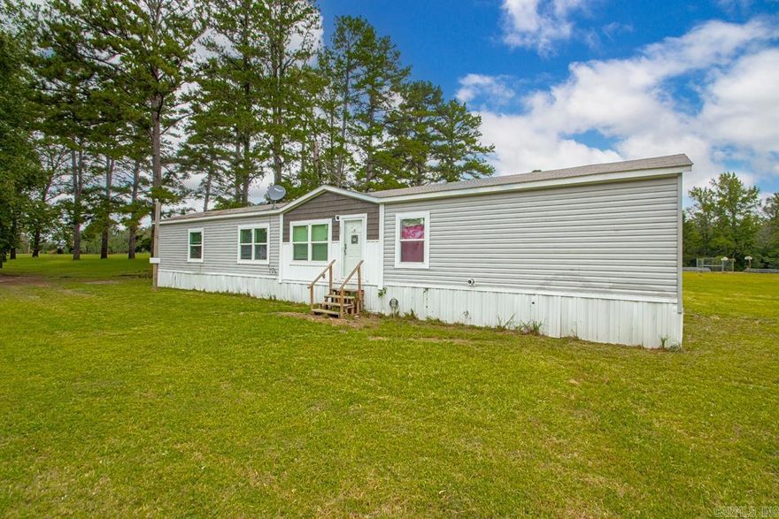 Welcome to 7804 Marche Lateral Road! This 3-bedroom, 2-bathroom home sits on a spacious .83-acre lot, offering the perfect blend of modern comfort and peaceful country living. Inside, you’ll find an open-concept floor plan featuring a bright living area with stylish wood-look flooring and wood beam accents. The kitchen is a true highlight with a large island, custom cabinetry, and sleek vent hood—ideal for cooking and gathering with friends and family.  The primary suite includes a double-vanity bath, soaking tub, and separate shower for a spa-like retreat. A dedicated laundry room and generous storage throughout add convenience. Outdoors, the expansive yard provides plenty of room for kids, pets, or a garden while still leaving space to relax and enjoy the quiet surroundings.  With move-in ready updates and easy access to nearby amenities, this property offers both value and versatility. Don’t miss the chance to make this home yours—schedule a showing today!