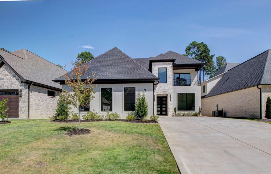 GATED neighborhood! One of Chenal's newest golf course neighborhoods that is conveniently walkable to shopping, dining and entertainment. Home is stunning and boasts five bedrooms, four full baths plus two half baths.  Open floor plan, beautiful fireplace and knock-out kitchen equipped with  refrigerator/freezer combo and double ovens. Butler's pantry. Primary suite and two additional bedrooms with their own baths are located on the main floor.  Upstairs is the game/media room with its own half bath and two bedrooms with bath between. Outdoor kitchen and fireplace. EV charger and epoxy flooring in garage. Fully fenced w/ green space behind. Meticulous attention to detail! 3 fireplaces throughout. Lots of natural lighting. Call for list of extra's.