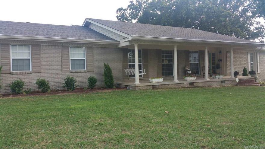 Spectacular view of the City!  Well-Loved totally UPDATED with Travertine flooring in over 50% of the upstairs and new carpet in the rest/granite on the countertops, stainless appliances,new light fixtures,all bathrooms updated with furniture vanities and fixtures/3 bedrooms (including Master) upstairs and 4th bedroom down.  Storage GALORE !  Formal LR upstairs w/ HUGE Family rm with wet bar and another fireplace down w/ Big PICTURE WINDOWS adorning the view.  New ROOF w/ Archetectural Shingles.