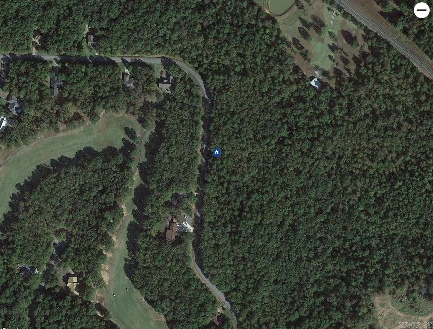 Nice level buildable lot across the street from Indian Hills Golf Course.   Back of these 2 replatted lots are wooded privately owned acreage.  A beautiful location for your home!!  And with plenty of space for the perfect placement of the house and driveway, yard.   Just minutes from the Indian Hills Golf  Pro Shop and Little Red Restaurant.  Houses across the street are on the golf course. Ask about Membership Dues/fees.