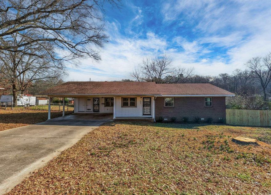<>Charming 3 bedroom, 2 bath home sitting on a large corner lot, with room for outdoor living<>Two spacious living areas<>updated flooring<> Newer HVAC and Furnace<>New Hot Water Heater<>Low maintenance brick exterior<>Vinyl Windows<>2 Large Storage Buildings<>Fully Fenced<>2 Car Carport<>This is a must see!!<>