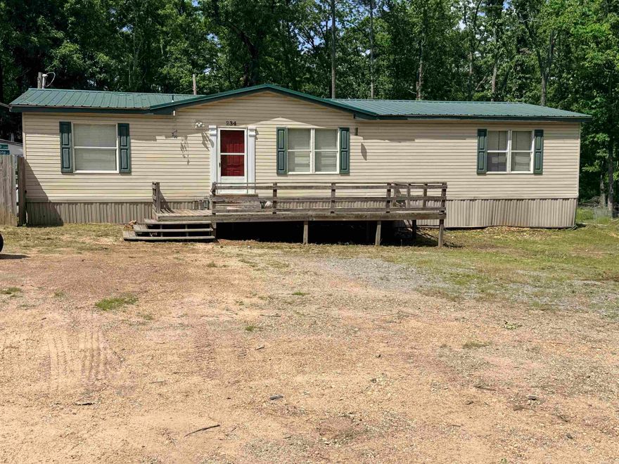 Come checkout this 4 bed 2 bath mobile home on a spacious lot with metal shop.   This property sits on a decent sized lot with room to expand as a fellow neighbor is willing to sell their vacant lot adjoining. Property has solid bones, come finish the updates and make it yours. The metal shop is perfect for storage, projects, or a work shop. It has 3 large bedrooms and a fourth bedroom that would be great as a nursery or a extra large walk in closet due to its proximity to the master bedroom.   Reach out with any questions or to schedule a private showing.