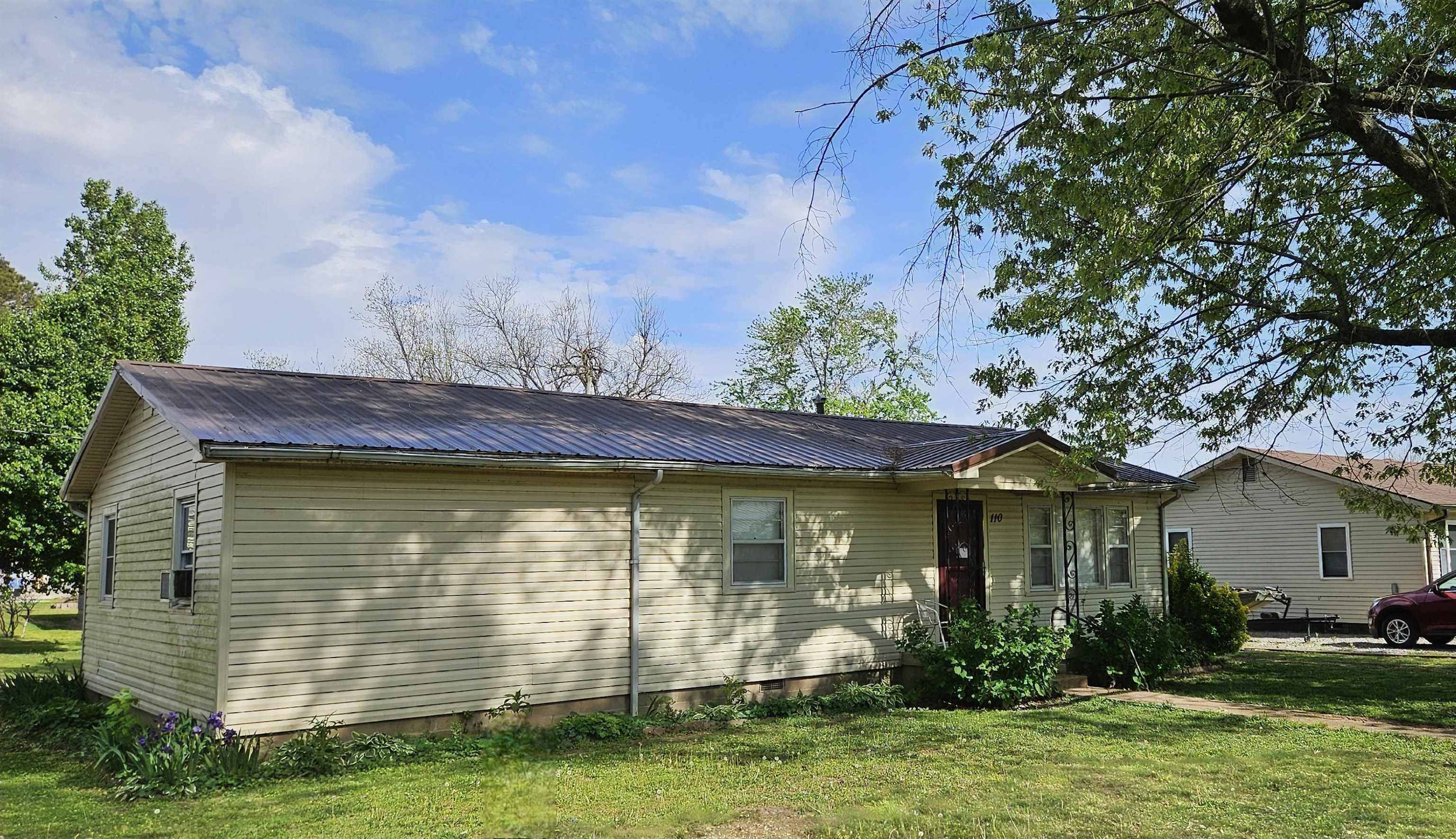 Fall in love with this charming, centrally located gem! This 3 bedroom, 1 bathroom home has beautiful hardwood floors, a durable metal roof, and plenty of character. The back porch is perfect for sipping coffee and spending time with company. Well maintained and ready to welcome it's next family. Call today!