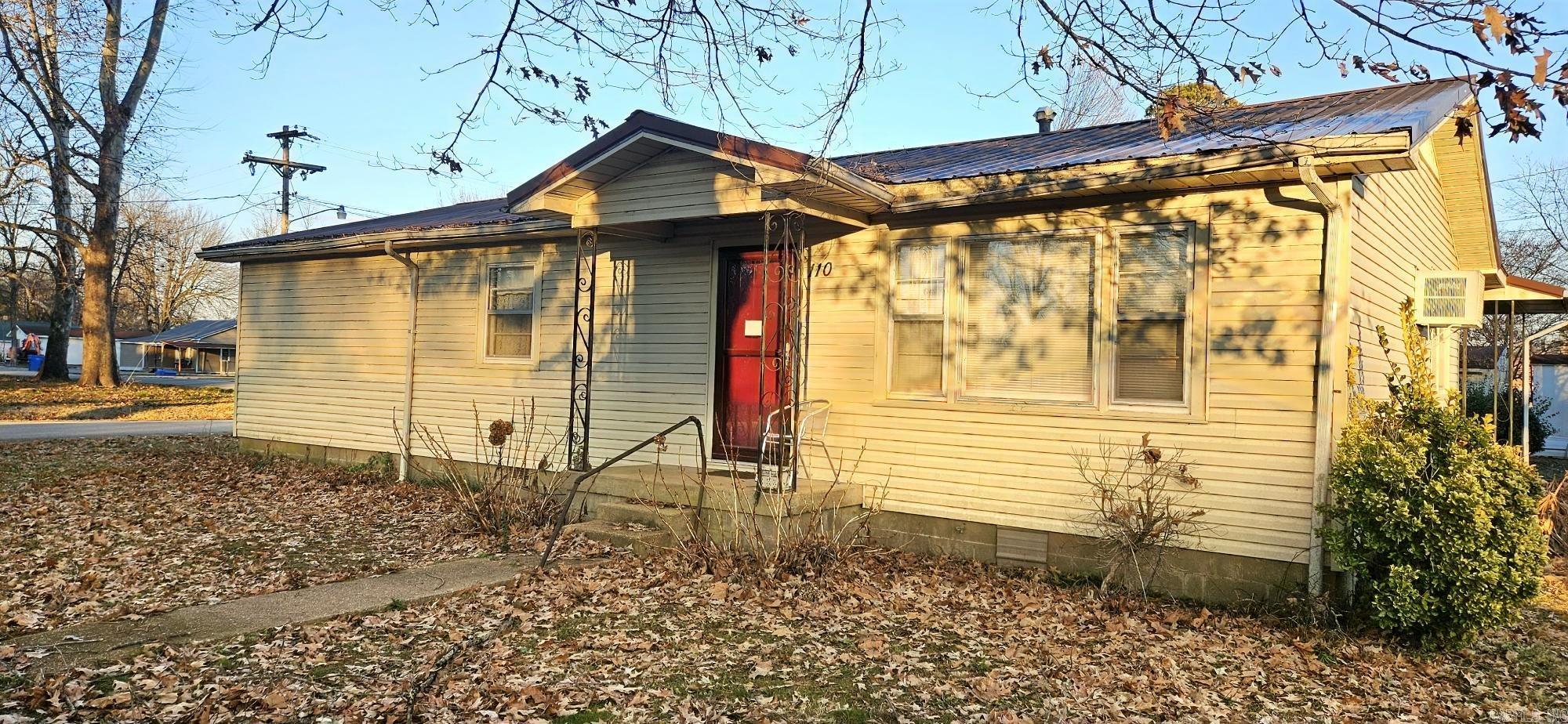 Fall in love with this charming, centrally located gem! This 3 bedroom, 1 bathroom home has beautiful hardwood floors, a durable metal roof, and plenty of character. The back porch is perfect for sipping coffee and spending time with company. Well maintained and ready to welcome it's next family. Call today!