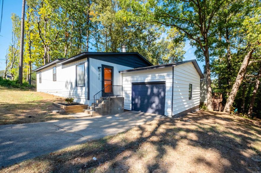 This stunning 3 bed/2 bath home has been completely renovated inside and out! This home has been brought back to life with a new architectural shingle roof, new LVP flooring throughout, updated light & plumbing fixtures, freshly painted interior & exterior, newly constructed back deck and so much more! The kitchen has been fully renovated with brand new cabinets & hardware, sleek granite countertops and new stainless steel appliances. Both bathrooms were also gutted and boast a custom tile walk-in shower w/ frameless glass door in the primary bath, new tub w/ tile surround in hall bath & new free-standing vanities/toilets in both. HVAC (A/C & furnace) replaced in 2023 & water heater replaced in 2022. One-car garage with auto door opener & add'l storage room (w/ exterior access).