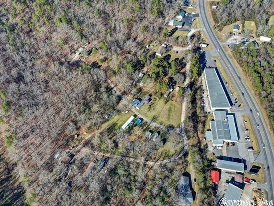These 7 rental properties are sitting on 10 + acres conveniently located 1/2 mile from front gate of Hot Springs Village, multiple restaurants, and shopping. All rentals are occupied with great tenants.