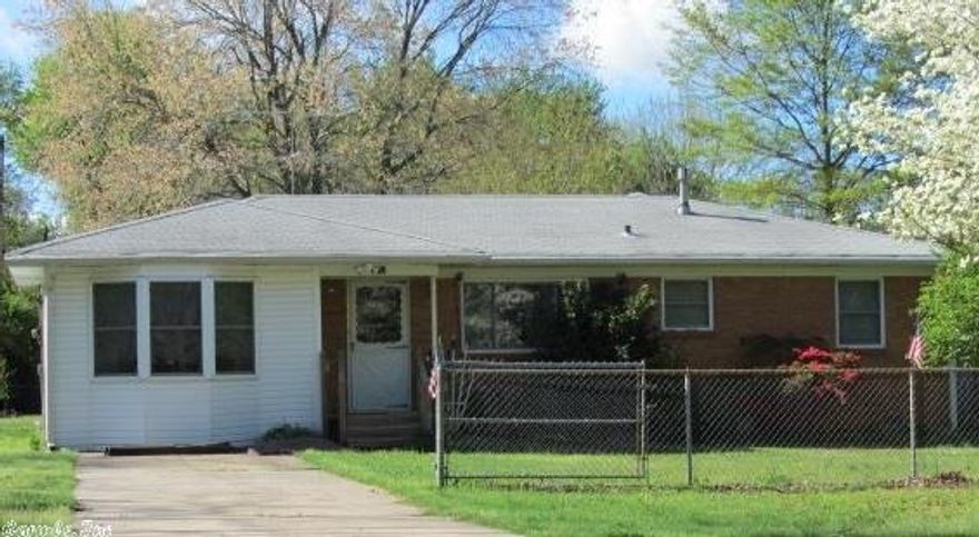 This house sits on a huge lot and has an outdoor garage/workshop/storage shed.  You can relax on the beautiful deck while enjoying a little privacy in the city.