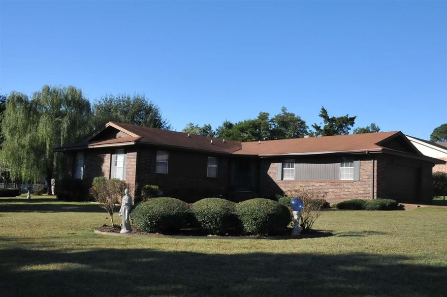 Immaculate 3 bedroom/2 bath house with 2 large living areas. This house sits on a corner lot and is fenced in on 2 sides. The front porch provides a great place for reading the paper and drinking your coffee. The yard features a beautiful gazebo and a storage building. Call today to schedule an appointment!