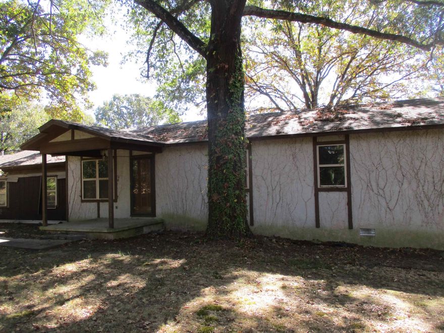 NEW PRICE!!! Lots of potential here!!!  This home is located in the heart of Morrilton not too far from parks and shopping.  House has been taken down to the studs and it's just waiting for someone to make it their own.  This home features covered parking, a new roof in 2023, and a small pond. This is a Fannie Mae Homepath property so go to www.homepath.com for more information and to submit offers.