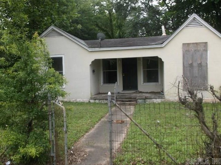 SOLD AS IS! This is a 3 bedroom, 1 bath home featuring a large kitchen and Greatroom along with a separate dining room. There is a LARGE backyard that is fully fenced. This home just needs a little love and care. It will make a great rent house. You will need approval letter and Earnest Money.