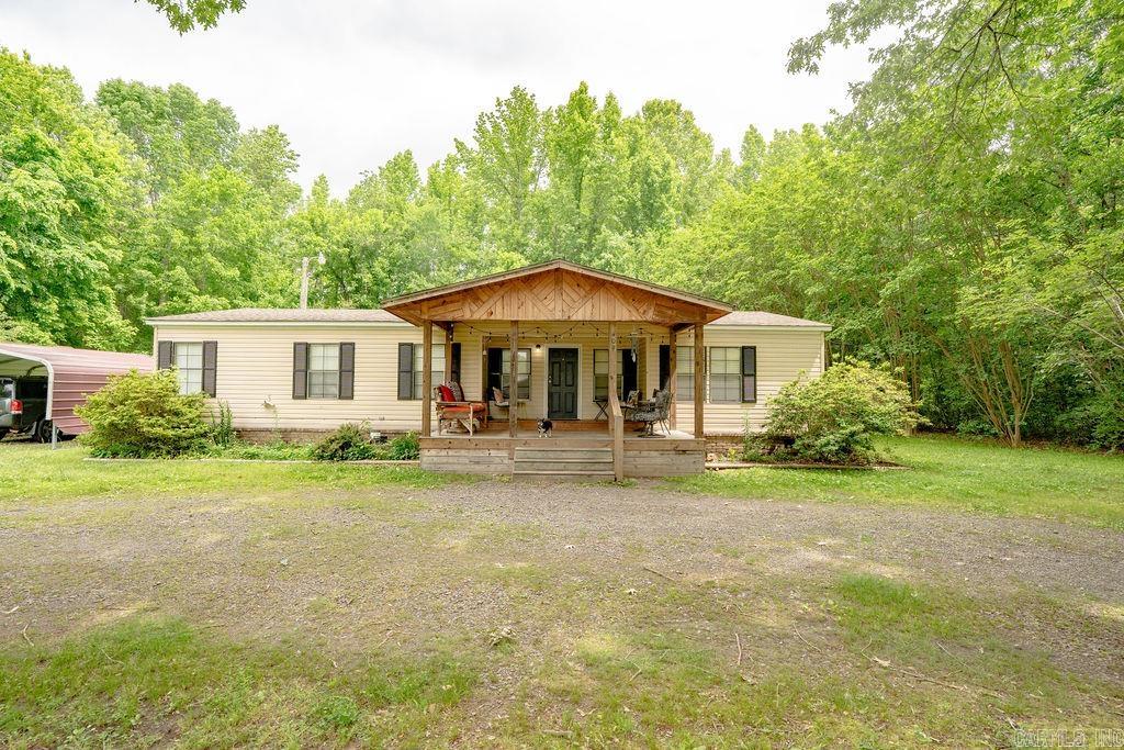 Enjoy a short walk to the walk-in access to world-class fly fishing on the Little Red River from this 3 bed, 2 bath mobile home—just minutes from Heber Springs and Greers Ferry Lake! Nestled in a quiet neighborhood, this charming property features a fenced backyard, above-ground pool, and recent updates including a new roof (2020), HVAC (2018), and interior updates within the last 5 years. The kitchen countertop is currently being replaced, offering a fresh touch for the new owners. Don’t miss this peaceful river retreat with convenient access to outdoor adventure!