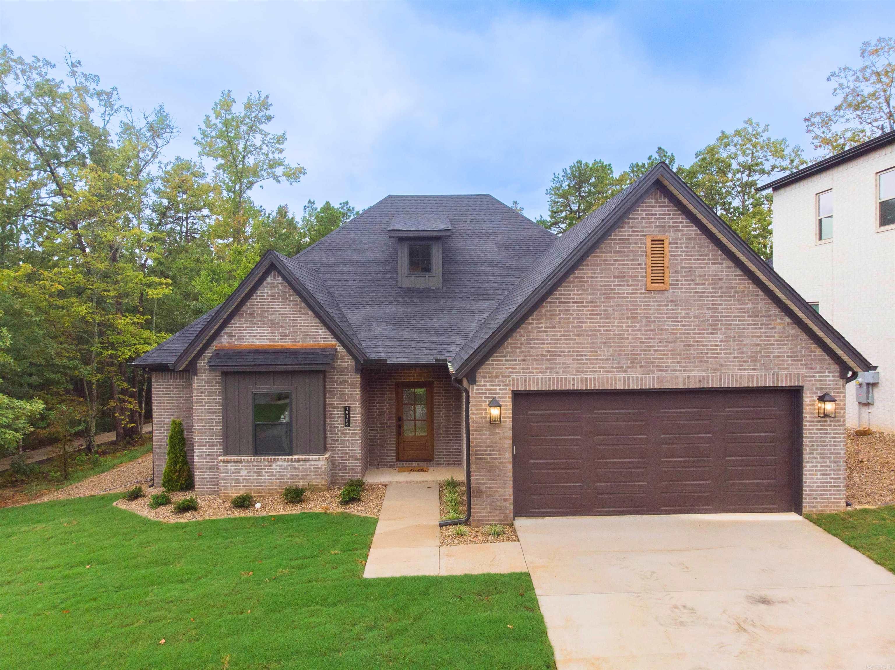 Welcome to 15109 Matterhorn Loop! This home has a waterfront view of the Pond! This move in ready home is located in the desirable Phase 2 of Stonebrook. Stonebrook was Voted AY Magazines Best Neighborhood in Central Arkansas! Enjoy gated privacy, scenic walking trails, a private lake, and community amenities in one of the most sought-after neighborhoods in Maumelle! Spanning 2,510 square feet, this beautifully designed residence offers the perfect blend of comfort, luxury, and natural beauty. Boasting 4 generously sized bedrooms and 3 full bathrooms, this home is ideal for families or those who love to entertain. The thoughtfully crafted layout includes a spacious open-concept living area, a gourmet kitchen with premium finishes, and large windows that fill the space with natural light. Set on a prime lot, this home offers unparalleled outdoor living with green space behind and a stunning waterfront view of the pond. Whether enjoying a morning coffee on the patio or hosting gatherings, the serene backdrop creates the perfect oasis. Set up a self guided tour of this home on the Hines Homes website.