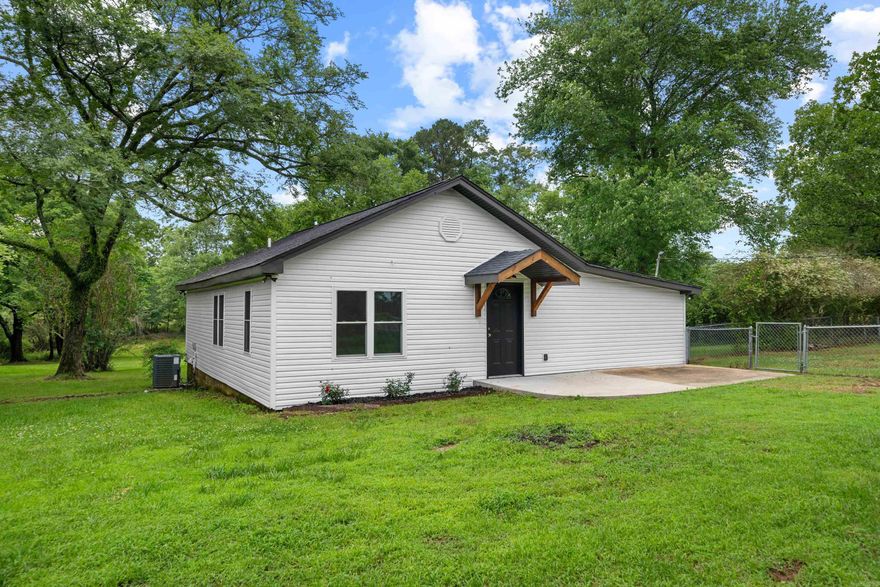 Updated 1950's 3 bed 2 bath cottage style house sitting on 1.7 acres. New: roof, siding, vinyl plank flooring, HVAC as well as updated electrical, and plumbing. Property has out an building that was previously used as a stable and part as a chicken coop as well as storage area.  Some fruit trees present on the property. Seller to offer $1000 appliance credit at closing with full price offer.