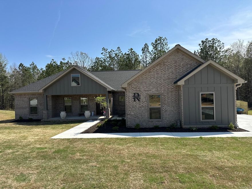 Brick new construction in developing neighborhood.