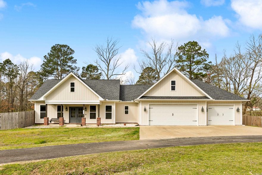 Custom home with a pool on 1.56 acres in Haskell!!  Come see this beautiful home that has it all. If you are looking for some elbow room, room to have chickens, or room to build a shop, this is the one! As you walk through the front door, you are greeted with vaulted ceilings accented with wooden beams. This open and spacious floor plan is perfect for everyday living and entertaining. 4 BR/2Bath. Features include: foam insulation, tankless water heater, oversized 3 car garage, LVP floors throughout, wood burning fireplace with gas starter, walk-in shower, large walk-in pantry, quartz countertops, gas range, and large farmhouse sink. Updates include: New HVAC, new pool pump, new thermostat, and extra blown insulation.
