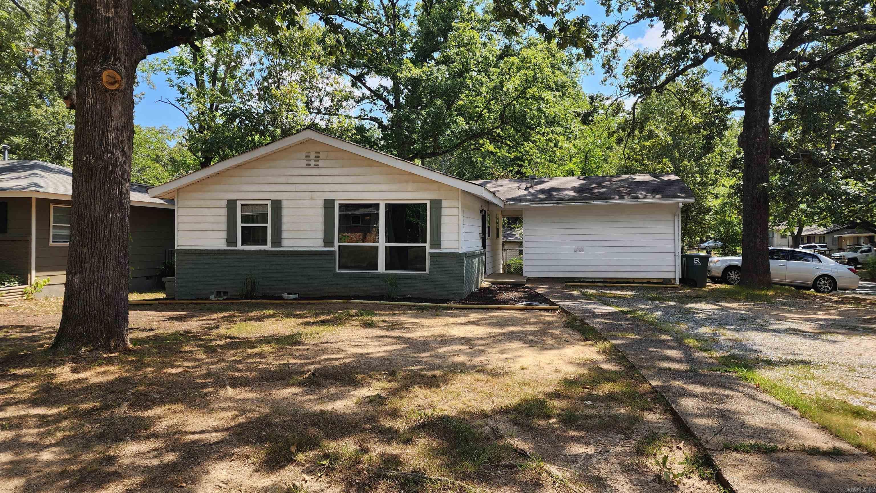 Why rent when you can own for less? Stop paying high rent—buy your own home today! This remodeled 3-bedroom home boasts gleaming refinished wood floors, new vinyl plank in the kitchen and bathroom, plus a brand-new stove and refrigerator. Enjoy vinyl insulated windows, central heat and air, a fenced backyard, carport parking, and a level corner lot—all at a fantastic price.