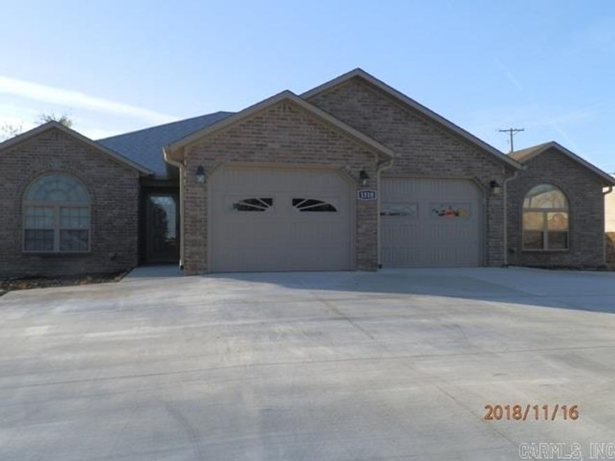 Close to restaurants, shopping and schools. The living/dining/kitchen are open to each other. Kitchen has a breakfast bar. Kitchen has stainless front appliances - self-cleaning electric range, side-by-side fridge, microwave and dishwasher. Laundry area sport new washer and dryer. Master bathroom has step-in shower with fold down seat and grab bars. Unit has an attached one-car garage. Rent includes lawn care. Apply with Property Manager. Application fee charged.