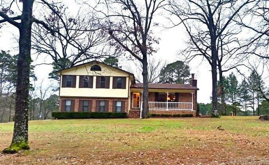 Park Setting 2 ACRE property just a short walk to the lake! Relax on the back deck listening to a stream running nearby or enjoy time in the 400sqft WORKSHOP w/electric. Step inside this tastefully updated home w/new countertops, composite granite kitchen sink & fresh paint. Featuring over 2000sqft w/3 bdms, 2.5 bths & 2 separate lvg areas. Country setting yet close to town & outdoor recreation.