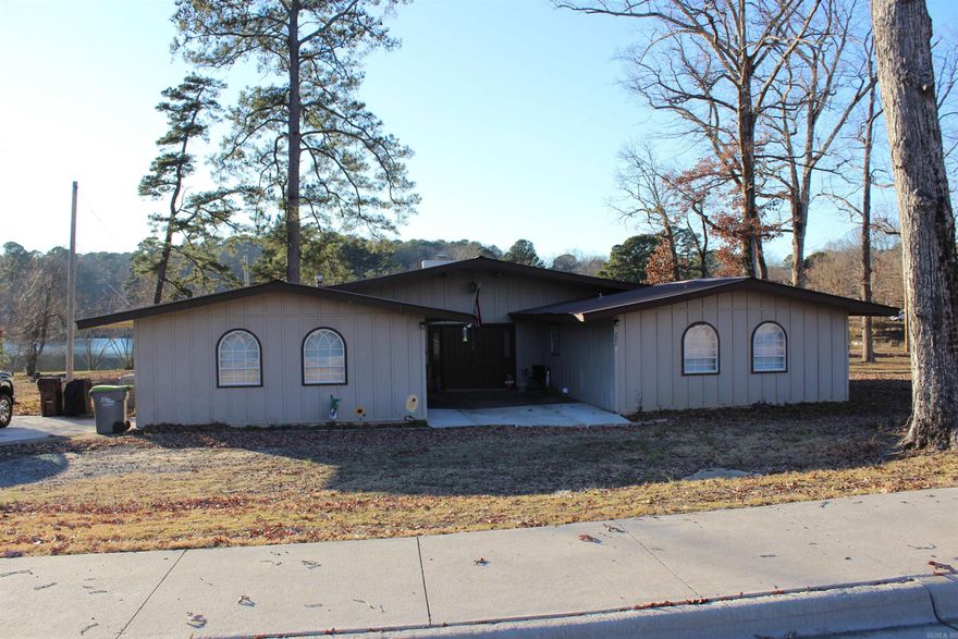 Large four bed, 2.5 bath home on lake. Large level lot. Private boat dock.