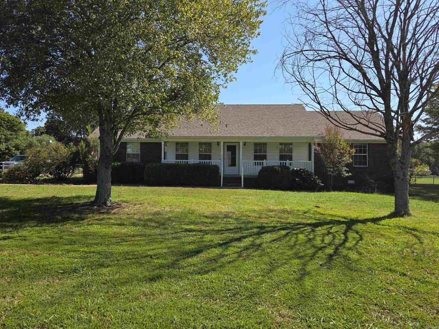 This 3-bedroom, 2.5-bathroom home offers peaceful country living with plenty of space. Featuring an office, large front yard, and expansive backyard with a shed, it’s perfect for those seeking room to spread out. Inside, the open living areas and spacious kitchen create a welcoming atmosphere. The master suite boasts a private bath, and two additional bedrooms provide ample space for family or guests. The property includes two garages for vehicles or storage, plus a backyard shed. With 2.5 acres of land, there’s plenty of room for outdoor activities. Don’t miss out on this country retreat!