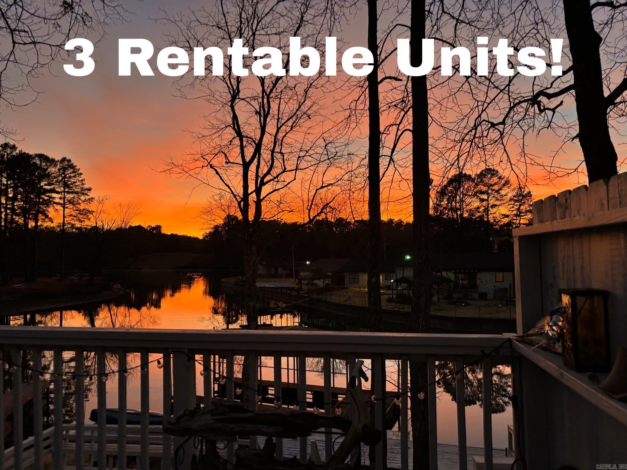 PEACEFUL SETTING WITH MILLION DOLLAR VIEW! 5 bed, 2.5 bath lakefront home with an efficiency unit for guests. The home has upper and lower decks - perfect for enjoying the serene nature and beautiful sunrises and sunsets - and a covered boat slip and dock for upcoming lake days. Would make a fantastic STR, vacation home, or full-time home. Only 20 minutes to Downtown Hot Springs, Bathhouse Row, art galleries, shopping, dining, parades, festivals, and more! 15 minutes to hiking and biking trails at Lake Oauchita and Cedarglades Park. Trees surrounding the property and next to the decks provide shade while enjoying leisurely lake days. There's also an outdoor grilling area, outdoor storage, and great fishing on the dock with storage under the deck for fishing and boating gear. The board walk has multiple boat hook ups for all the lake toys. Owner has updated A LOT! See attached list. The home is split into two units so each unit could be rented out separately. Current owner didn't want to use as short term rentals but this property is outside city limits and allowed. Many possibilities! COME AND SEE! Agents - please schedule all showings with Showing Service.