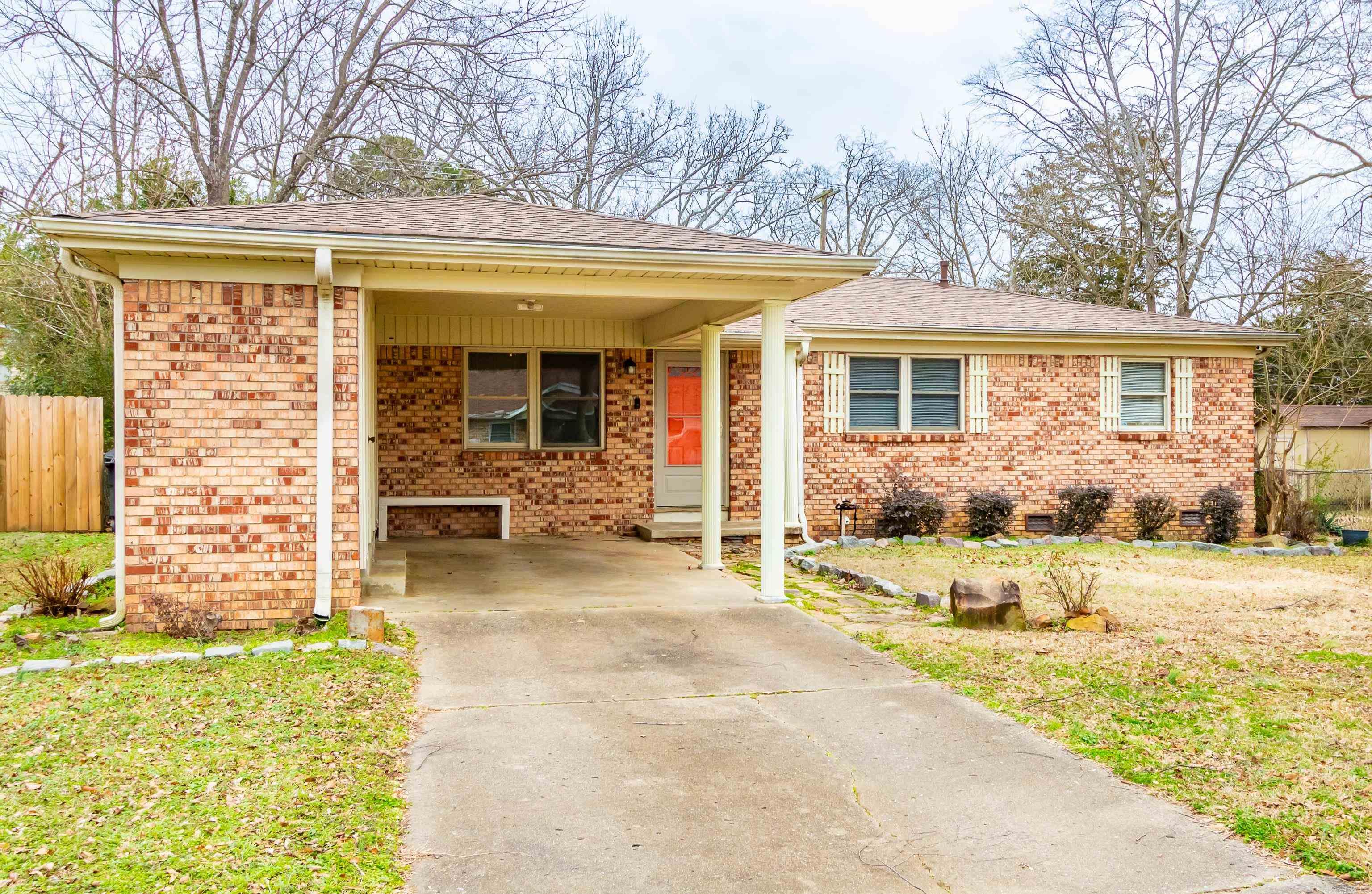 Perfect Starter or Downsizer! If you're looking for a cozy, affordable home with updates already done, this is it. Whether you're buying your first place or simplifying life a bit, this one just feels right. The kitchen is bright and functional with plenty of counter space, cabinet storage, and a gas stove that’s ready for home-cooked meals. Bedrooms are comfortably sized, and the primary bedroom includes a private half bath. Natural light fills the home from every angle. Step out back to a fully fenced yard—ideal for pets, kids, or relaxing evenings. There’s also a smokehouse for grilling, plus extra storage under the carport for tools or seasonal décor. Major updates include: New roof (2023) Fresh paint (2025) New carpet (2025) Flood insurance required (estimated $896/year), but seller will cover the first year premium with an accepted offer—nice perk for buyers!
