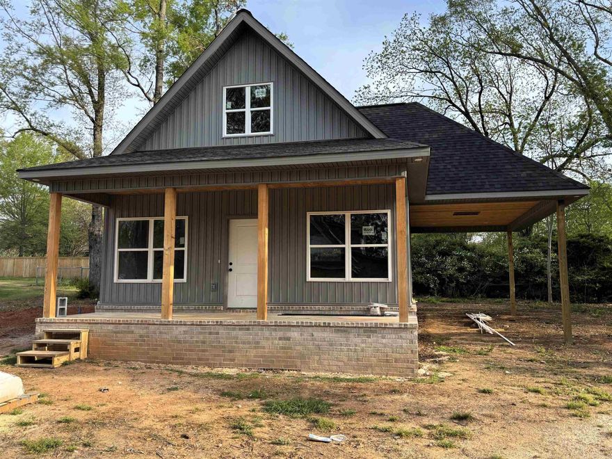 Brand new with one year warranty*studio home with upstairs loft that could be another bedroom*no carpet in house, it's all vinyl planking*kitchen has plenty of cabinets/drawers and a huge island*large bathroom with walk-in shower*nice laundry room*low maintenance home that will have low utilities too*private driveway to house*