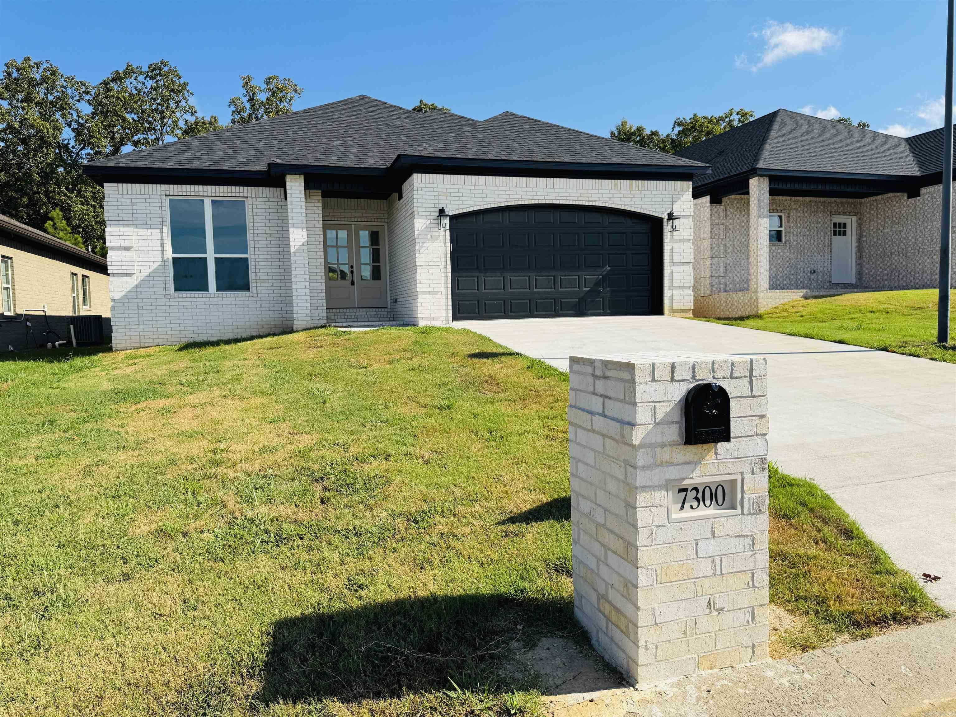 Affordable New Construction in Sherwood. This home is beautifully built with attention to detail. Covered porch in the front and covered patio in the back. All brick for easy maintenance. 9'-10' Ceilings throughout. Granite counter tops. Stainless Steel appliances. Crown molding throughout the home. Windows capped and trimmed. Walk-in master closet. LVP floors in living room, kitchen, and dining area. Custom tile in all bathrooms. Fireplace in the living room. All electric for easy maintenance.