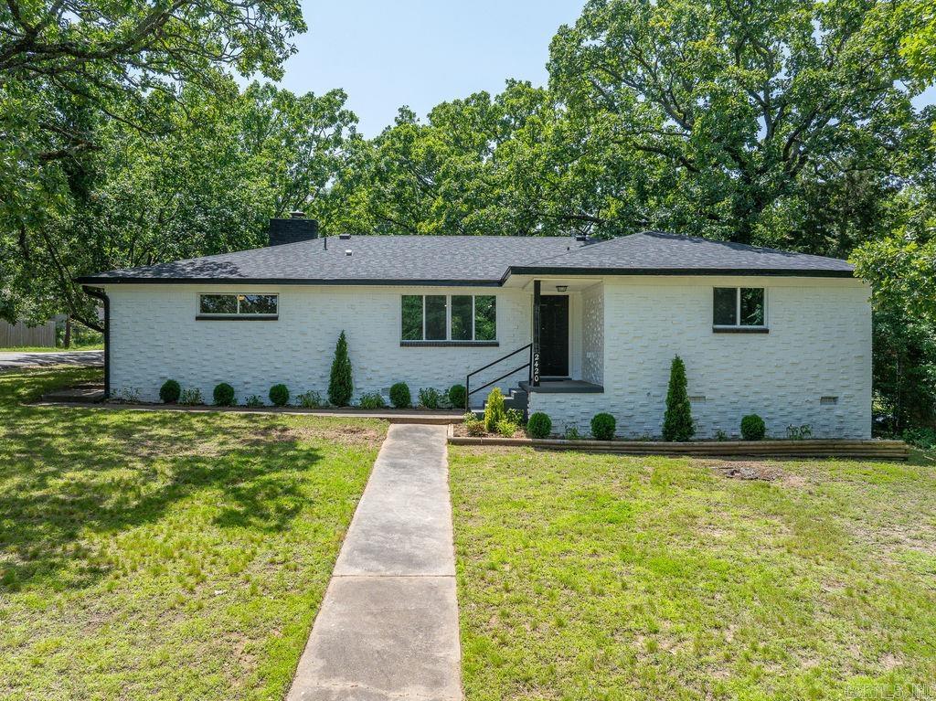 Spectacular newly remodeled 4 bed 3 bath home in excellent neighborhood and beautiful curb appeal. You will not be disappointed when you walk in and see the incredible open floor plan, perfect for families and entertaining. The large island in the middle acts as a center into the dining area and then into a large family room. Every detail of this house is practically new plus there are two masters, perfect for an in-law quarter! Everything is NEW: - Roof - AC unit - water heater - countertops, cabinets, and backsplash - kitchen appliances - electric system (up to current city code) - Plumbing system (up to city code) - light fixtures - floors - Interior and exterior paint - bathroom vanities and showers - windows - insulation in walls & attic - outside landscaping - and so much more! This home has been given city approval and ready for you to move in! Call to set your appointment today and make this home yours! Agents see remarks