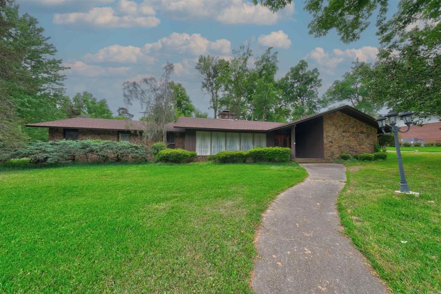 This corner lot boasts a generous four-bedroom, two-and-a-half-bath residence, encompassing a total living space of 3,116 square feet. It offers plenty of room to realize your ideal lifestyle.