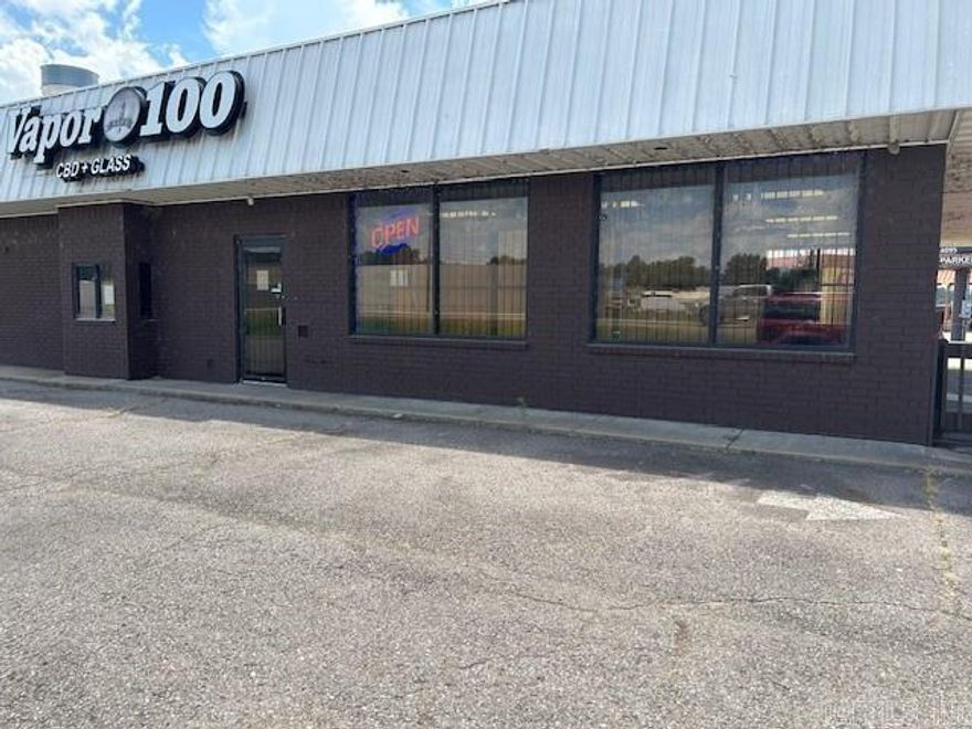 Location, Location, Location! This retail building sits near the intersection of Hwy 7 and Hwy 28 in a very high traffic area in front of the Dardanelle Walmart. Currently a smoke shop with a lease in place at $3,000 per month. Retail area has been remodeled with new vinyl plank, paint and everything needed for a great retail space. Drive thru window. Rear of building is set up for a restaurant kitchen, complete with a walk-in freezer, commercial sink, large stove & vent a hood. Great investment property.