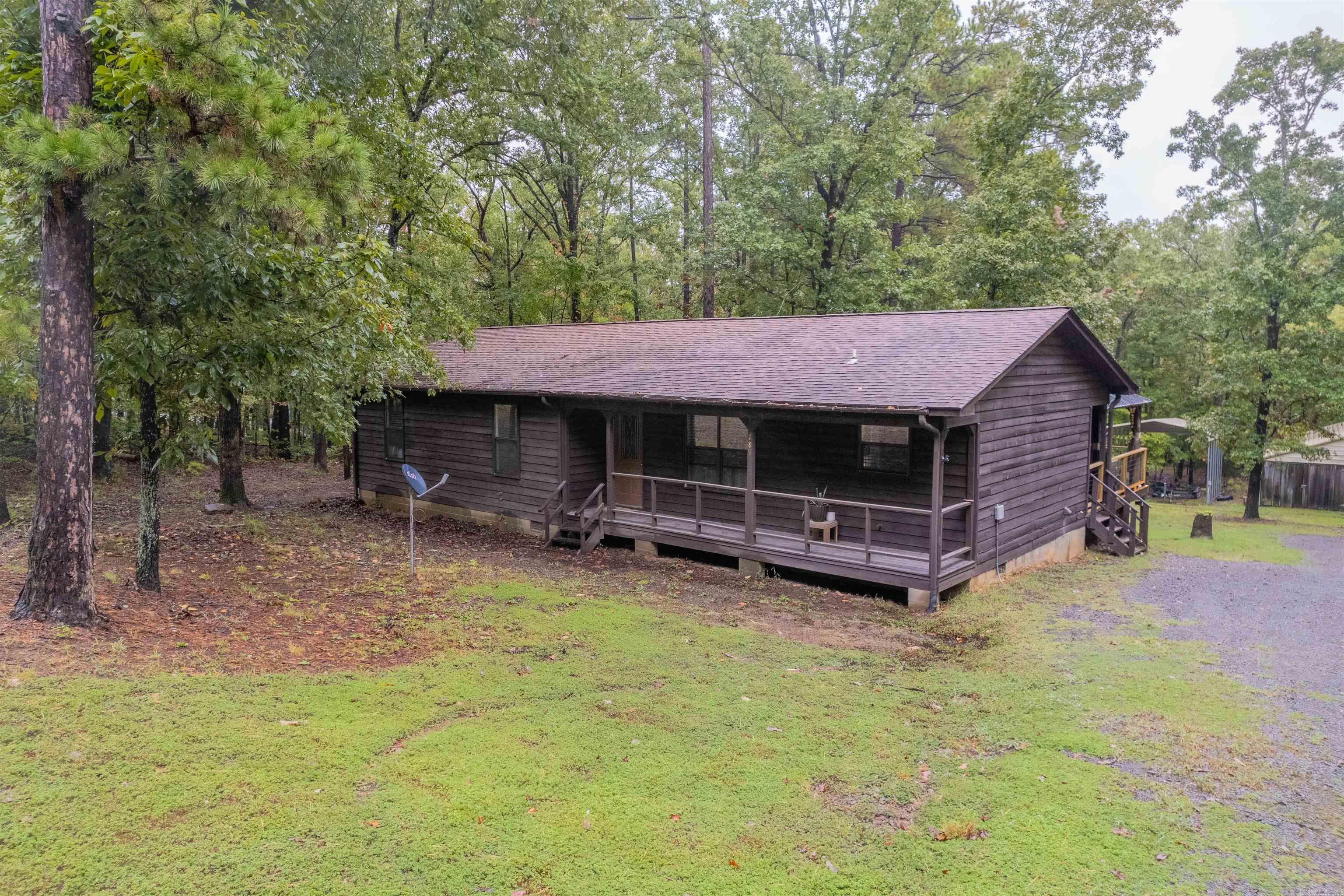 Looking for a cabin or full time home on Greers Ferry Lake? 1.32 Acre lot with 16x25 detached garage and a 30x50 building, Also a large 15X30 covered awning for boat or camper storage. Home has 3 bedrooms, 2 bathrooms, separate laundry, front porch, A new 2024 large back porch with new Gazebo! Minutes from Narrows boat ramp and Sugarloaf Marina. This property goes to the white line, a must see!!!