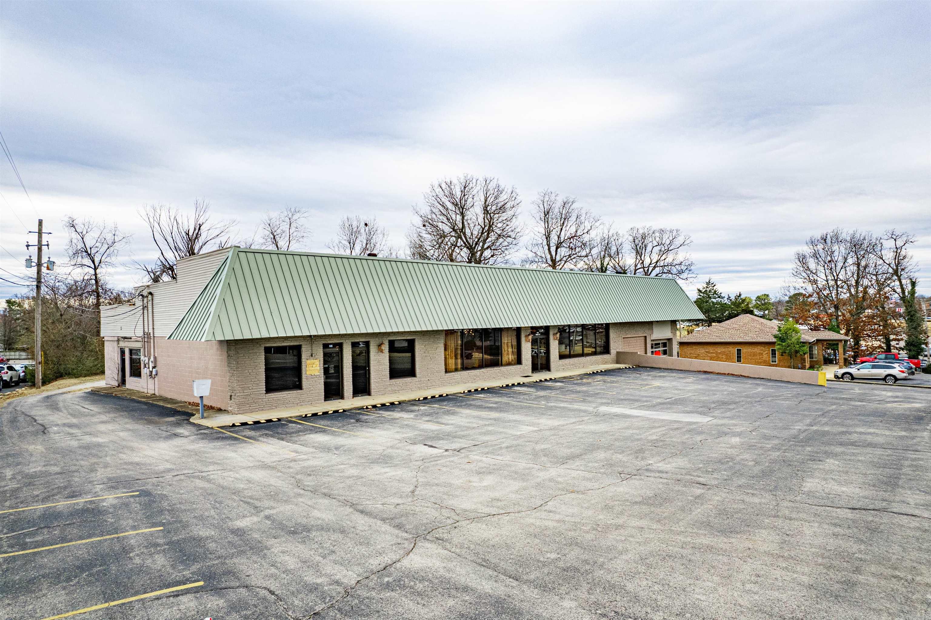 This high-visibility commercial property offers approximately 7,200 sq. ft. of flexible space, perfect for your business with plenty of room to growāor lease out for additional income. Situated on 0.88 AC M/L, this property features 5 spacious showrooms, 7 offices, and 5 separate half-baths, ensuring functionality for a variety of business types. Equipped with 4 HVAC units, 4 electric meters, and a slanted rubberized roof, itās built for efficiency and convenience. Plus, a 16x28 storage building in the rear provides extra space for inventory or equipment. Donāt miss this prime commercial opportunityābring your vision and make it yours today!