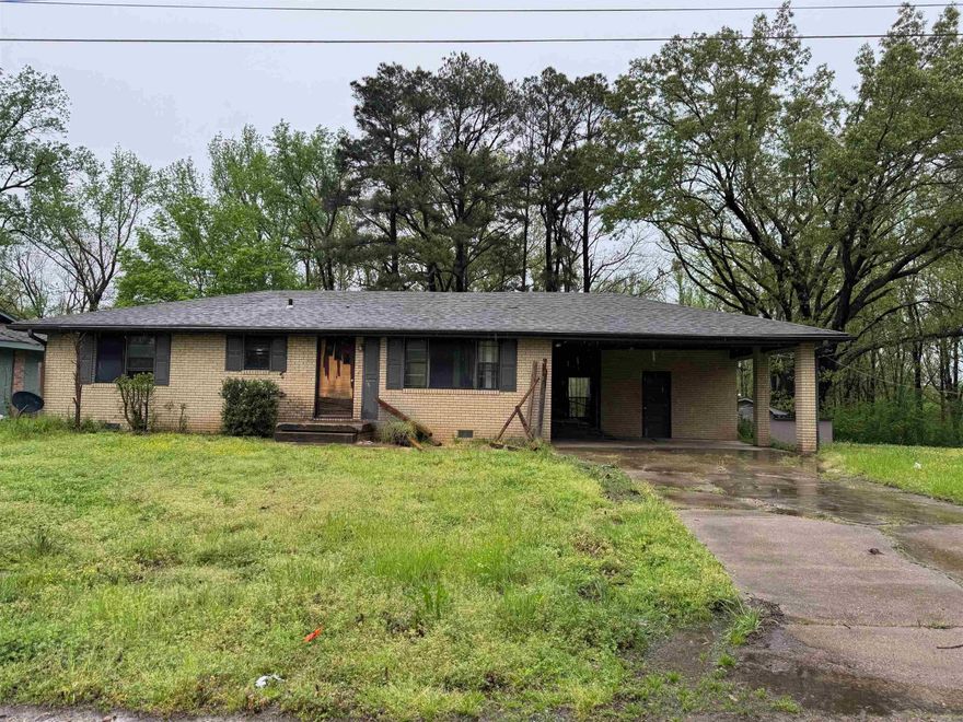 This 3 Bedroom 2 bath is a fixer.