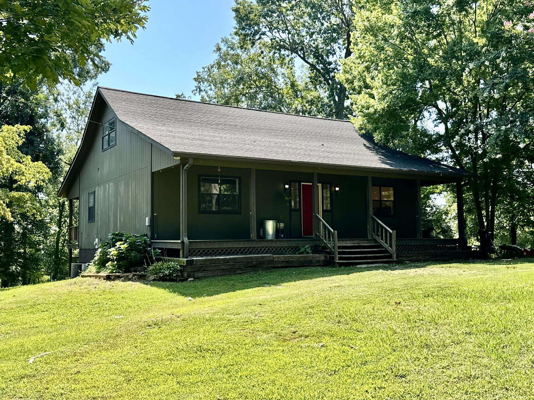 Tucked away in the heart of the Ozarks, home offers the perfect blend of privacy, space, and convenience on 20 mostly wooded acres, ideal for hunting, exploring, or simply enjoying nature. The main level has a spacious living area, kitchen, dining room, breakfast nook, half bath, and a laundry room/pantry. The master suite features a full bathroom and a walk-in closet. Upstairs, you'll find two oversized bedrooms and a full bathroom, perfect for family or guests. The fully finished walk-out basement includes a large family room, a third full bathroom, ample storage, and a dedicated workshop area for hobbies or projects. The home has been freshly painted inside, and a new roof was installed in 2021, making it move-in ready. Enjoy peace and seclusion just minutes from the National Forest, local creeks, the scenic White River, and all the charm of Downtown Mountain View. Whether you're looking for a full-time residence, a weekend getaway, or a hunter’s paradise, this property has it all!