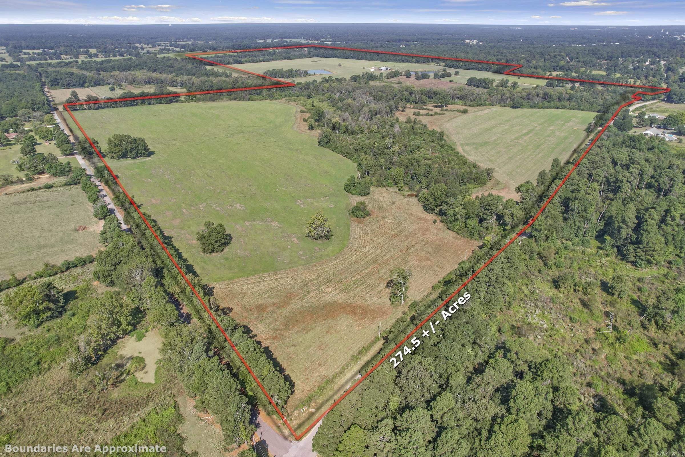 Looking for the perfect location to run a cattle operation, this has everything you will need, 2 creeks, 2 ponds, fenced with 5 strand barbed wire, predominantly bermuda/jigg grass, 60 x 80 hay barn will hold 400 4x5 1/2 rolls, sorting pens, priefert head gate/chute with load out. This property is just south of the city limits of Hope, county road frontage on two sides. Contact our office for all the details.