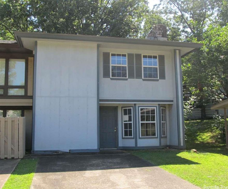 Not Your Normal Townhouse. This "Fixer Upper" is a bank owned townhouse that has been "gutted"! The exterior is complete but the interior has been taken back down to the stud walls inside. Start all over again with new kitchen, bathrooms and complete remodel of the interior. You'll have a 2 bedroom, 1 and 1/2 bath home with additional powder room 1/2 bath and fireplace in the living room. Priced to sell at $16,500.00 O.B.O.